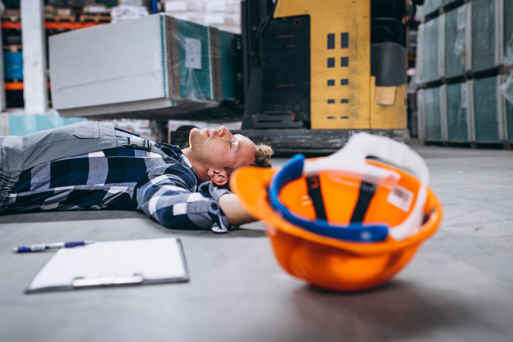 Warehouse or construction worker injured at work